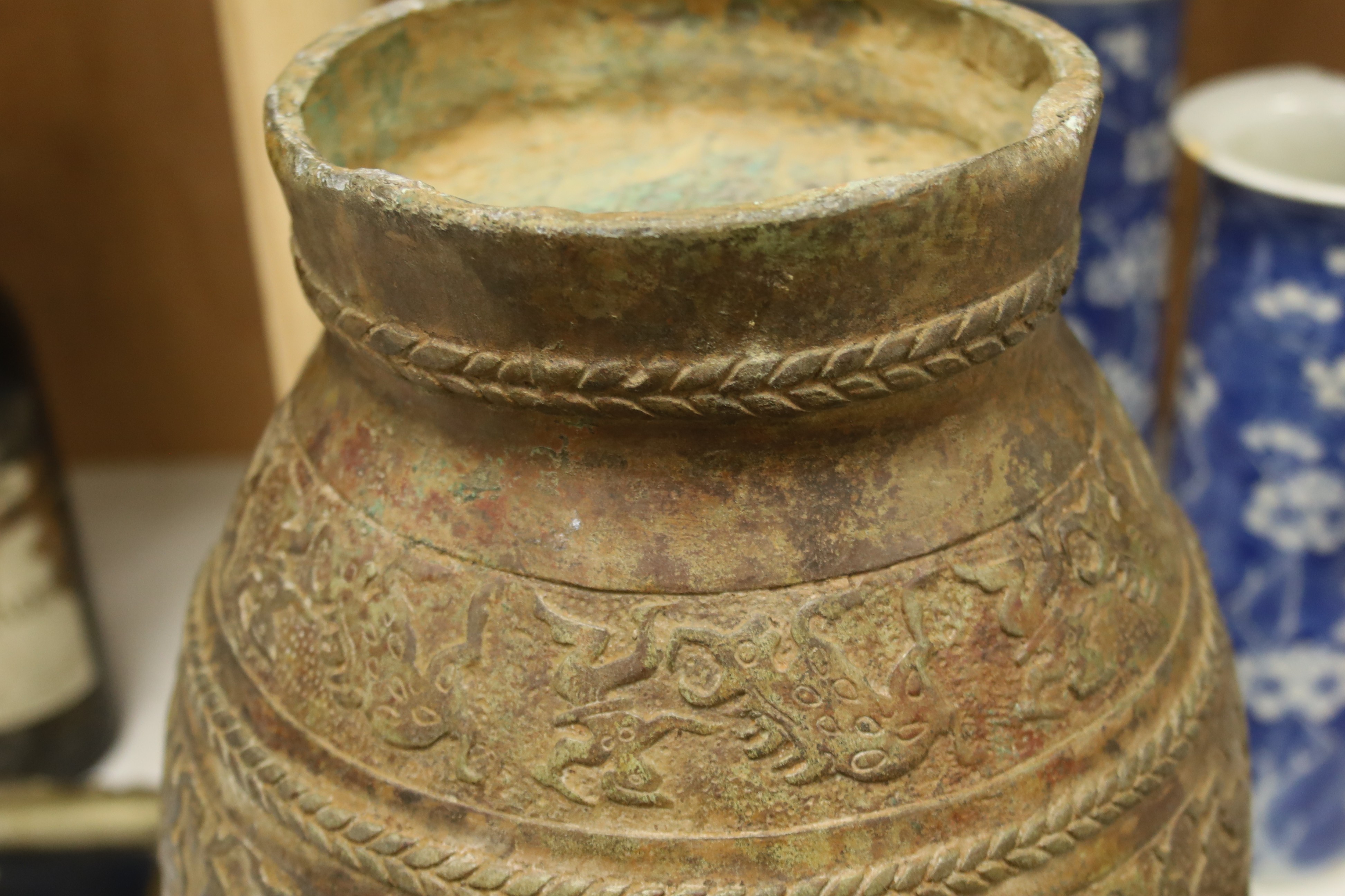 A Chinese cast bronze jar and cover, height 40cm
